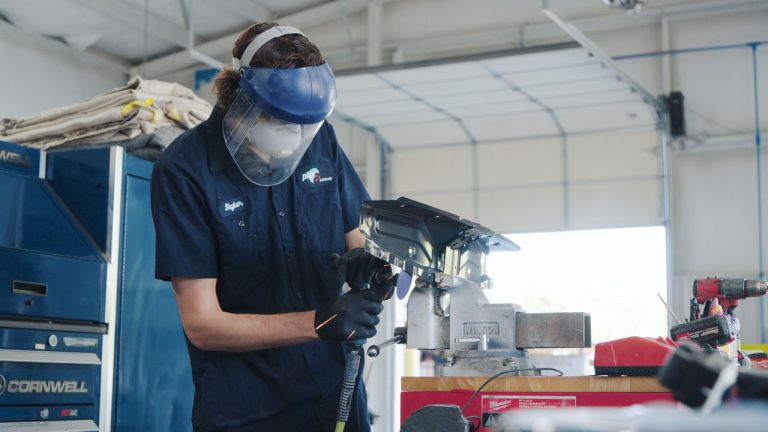 accident repair tech blue uniform in hendersonville